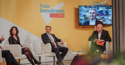 Sabine Kuhlmann at panel discussion with Christian Lindner
