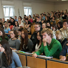 Students listening to a lecture in the auditorium
