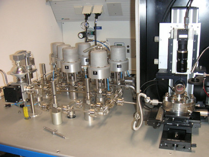 Extraction line (left), sample chamber and microscope (right)