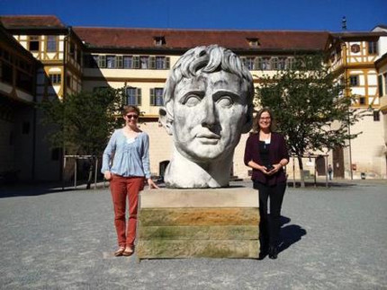 Annual XPrag meeting 2016 in Tübingen, Claudia and Clare in front of the statue of Emperor Augustus