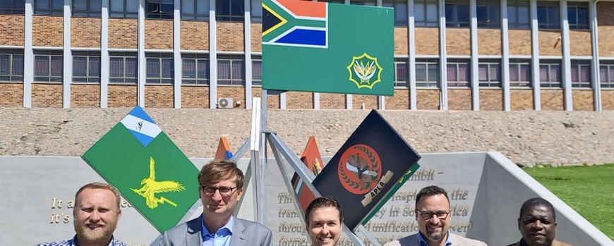 The War Studies Delegation in front of the Armed Forces Memorial at the Military Academy, from left to right: Evert Kleynhans, Sönke Neitzel, Alex J. Kay, Christian E. Rieck, Louis Makau.