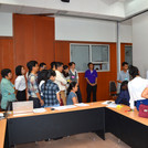 Participants listening to group presentation