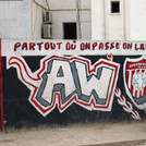 Wandgemälde, Tunis. Gemälde der Ultra-Vereinigung African Winners 95. „Überall, wo wir sind, hinterlassen wir unsere Spuren.“