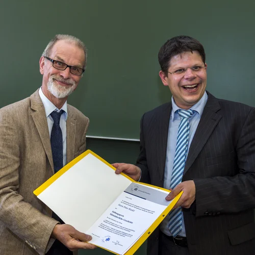 Prof. Dr. Heinz-Dieter Heimann mit dem Preisträger Peter Riedel