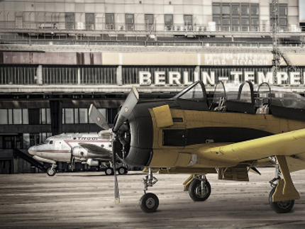 airplane in front of the former Tempelhof airport building