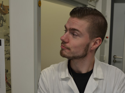 Picture shows Cevin a Caucasian man in lab coat