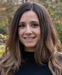 A portrait photo of Dr. Maria Miguel