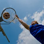Student playing basketball