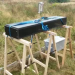 Picture of the first detector prototype operated on grass land at the Wüstebach site | foto: Cosmic Sense consortium