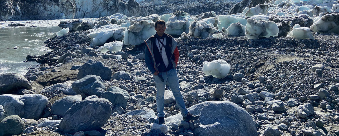 Dr. Georg Veh in front of Lake No Lake in British Columbia (Canada), this lake is dammed by the Tulsequah glacier in the background and empties several times a year. - 