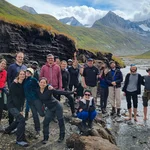 Group in front of a former glacial lake with lake sediments and peat