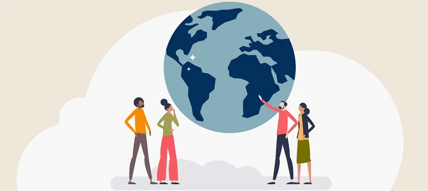 students holding a globe