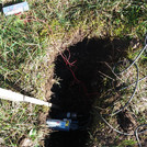 Field site Graswang: Open soil pit with soil moisture sensors installed in different depths | Photo: Cosmic Sense Consortium