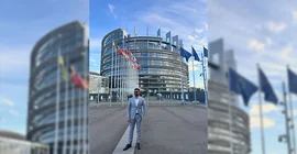 Albin Babu, a student at the University of Potsdam, in front of the European Parliament in Strasbourg.