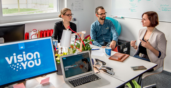 The three “visionYOU” founders in their office in Golm. Photo: Karla Fritze.