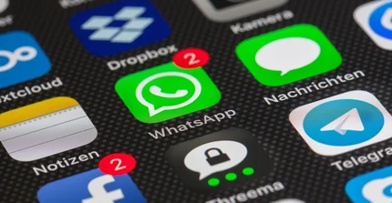 The picture shows apps on a mobile phone.