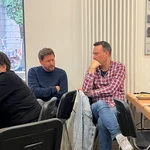 Participants of the DH Jewish Hackathon talking.