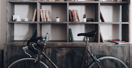 bike in front of a shelf