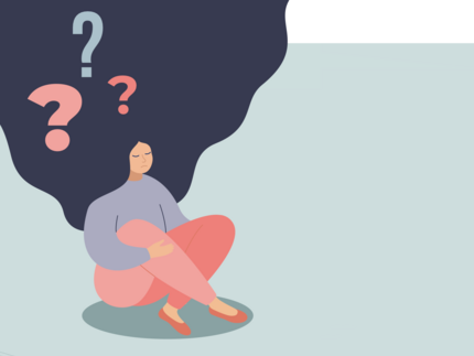 Frau mit Fragezeichen in Haaren