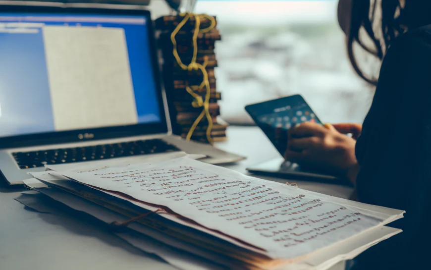 Worksituation with computer and paper