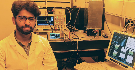 PhD student Sahil Shah performing measurements in the perovskite lab