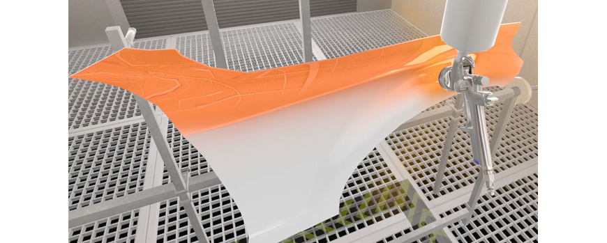 Eine virtuelle Lernumgebung: Ein Fahrzeugteil wird mit einer Lackierpistole mit orangener Farbe besprüht.
