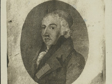 Ovales Porträt eines weißhaarigen Mannes im Halbprofil. Er trägt eine Kappe und einen Mantel mit hochgestelltem Kragen.