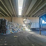 Unloading plastic waste at the plastic sorting plant of the Consorzio Industriale di Oristano.
