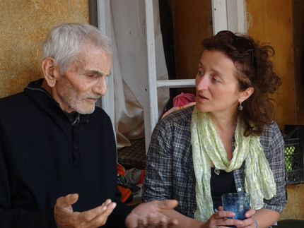 Nana Mzhavanadze (right) interviewing Bochia Kaldani in Adishi.