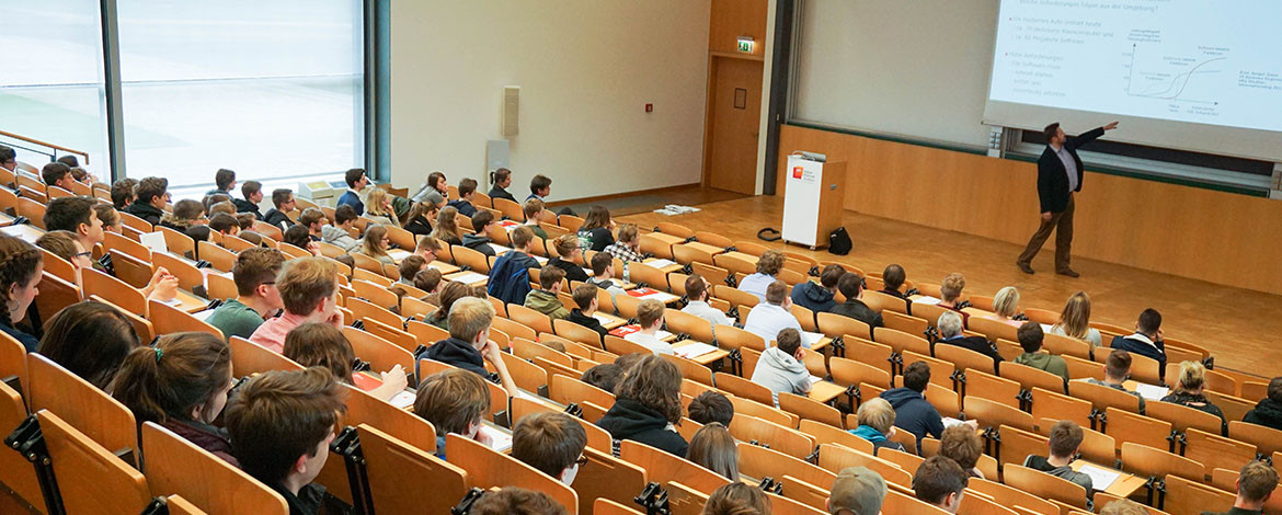 An auditorium with students