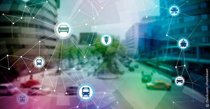 blurred background of two skyscrapers, the road between them and some vehicles, sharp foreground: schematic representation of the interconnection of different means of transport (bus, train, car, motorcycle, and others)