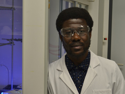 Picture shows Augustine a man of colour in lab coat