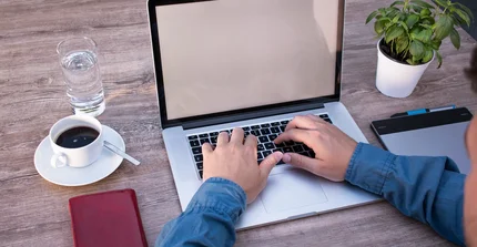 The picture shows a workplace at home.
