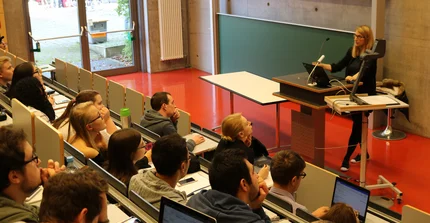 Hanna in front of students