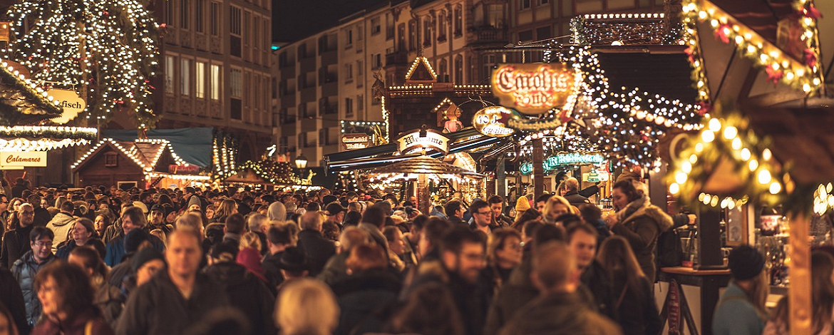 persons visiting a Christmas Market - 