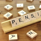 scrabble letters forming the word pension