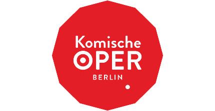 Roter Kreis mit weißer Schrift Komische Oper Berlin