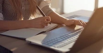 Person writing thesis