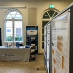 Sponsor desk with poster