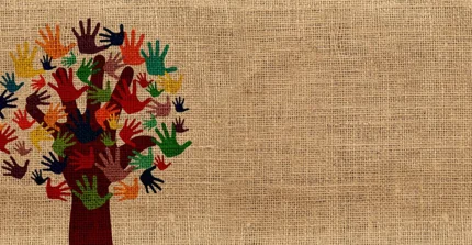Tree crown formed from colorful hand prints