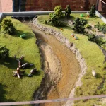 Floodplain model with decoration and water