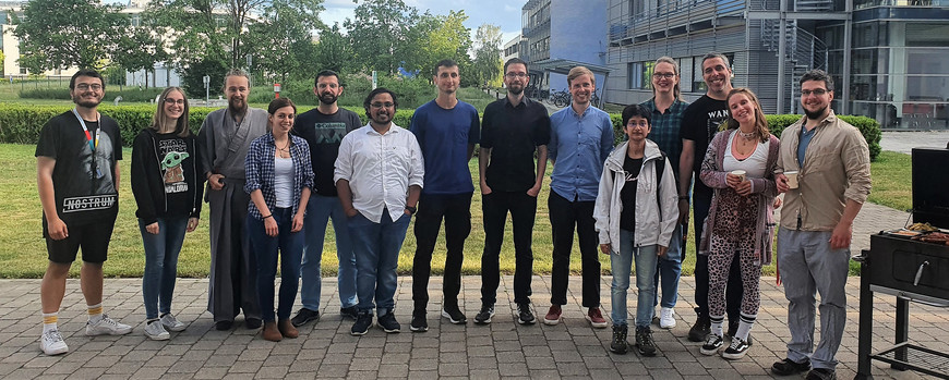 picture of all group members outside while BBQ