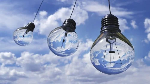 light bulbs in a blue sky - new ideas for the future