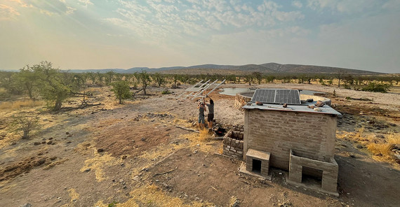 Installation of a solar-powered telemetry base station.