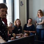 Aude showing the ultrasound equipment in her LOLA lab