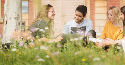 A group of students on the campus outside