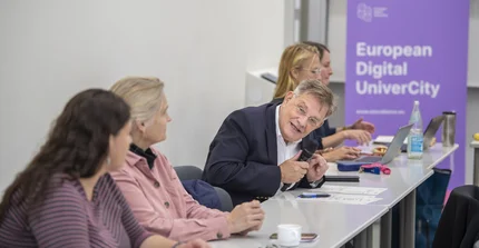 Several people in a meeting