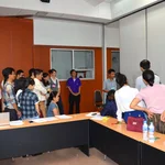 Participants listening to group presentation