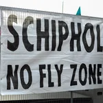 A political banner declaring Schiphol a No Fly Zone