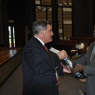 Prof. Schweigert gives present to HE Angula